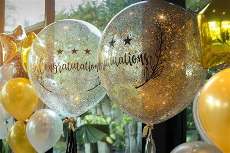 Celebration Gold And White Balloons With Sparkles And Congratulation