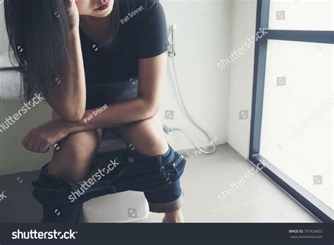 Woman Sitting On Toilet Bowl Thinking Stock Photo 737426875 Shutterstock