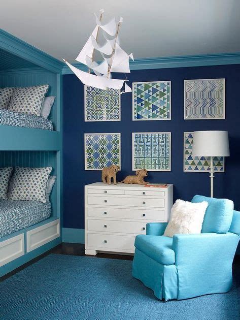 Two Tone Blue Boys Shared Bedroom Features Framed Stacked Blue And