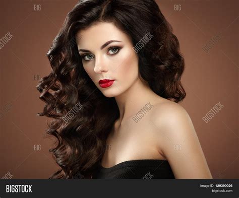 brunette woman curly image and photo free trial bigstock
