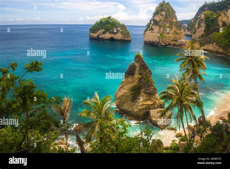 Beautiful Aerial View Of Tropical Paradise Beach And Rock Cliff With