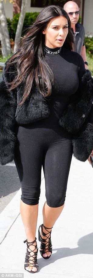 Kim Kardashian At It Again Flaunts Her Massive Curves In Skin Tight Bodysuit Photos Gistmania