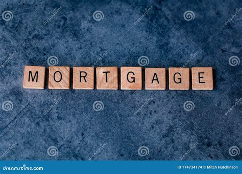 Mortgage Spelled Out In Wooden Letter Tiles Stock Photo Image Of