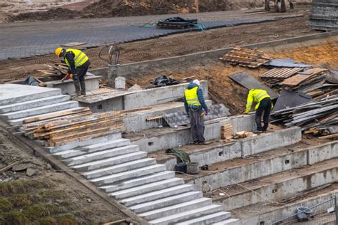 Builders Working On Construction Foundation Man Strengthen Concrete