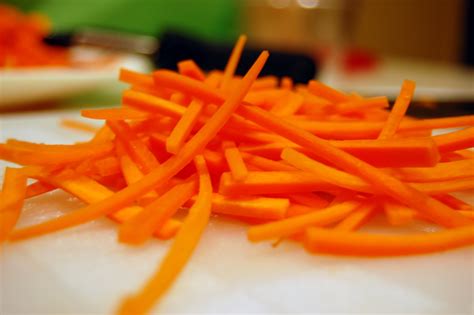 Use a sharp chef's knife to slice the carrot in half horizontally. Julienne Carrots 250g