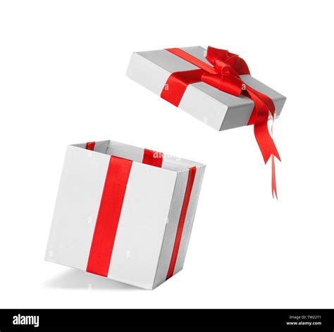 Open T Box With Red Ribbon On White Background Stock Photo Alamy