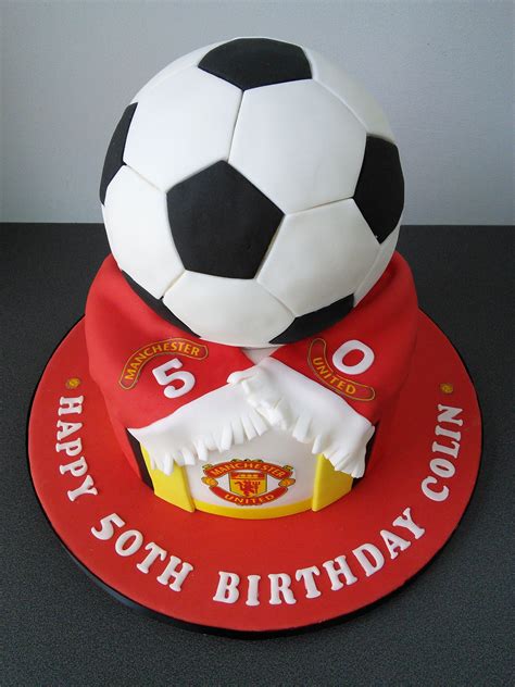 Ice the top with green icing and an icing spatula. Manchester United football club 50th birthday cake. With ...