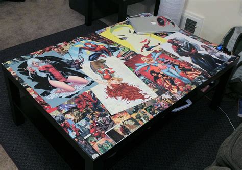 I saw this on the bargain table and snapped it up. Comic book coffee table I made. The surface was nicked so ...
