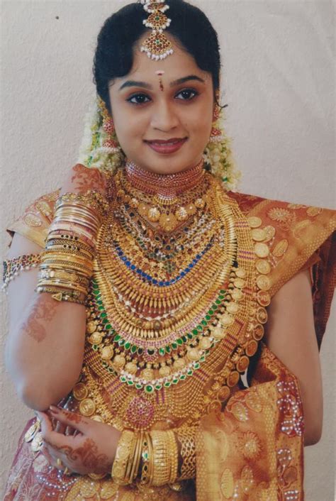 Malayalee Brides With Load Of Gold South Indian Bridal Jewellery Indian Bridal Wear Bridal