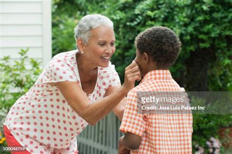 Grandma Pinching Cheeks Photos And Premium High Res Pictures Getty Images
