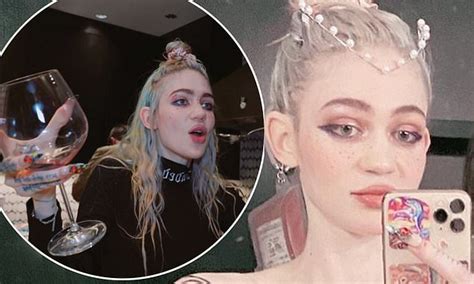 Grimes Poses TOPLESS As She Shows Off Her Body Art Design Daily Mail Online