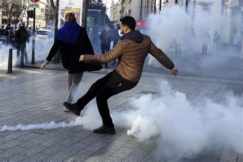 Paris Police Fire Tear Gas To Disperse Banned Virus Protest AP News