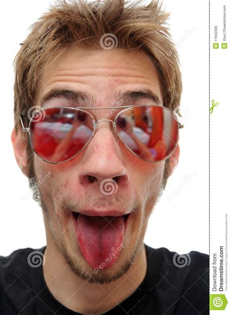 Young Man Sticking Tounge Out With Aviators Stock Image
