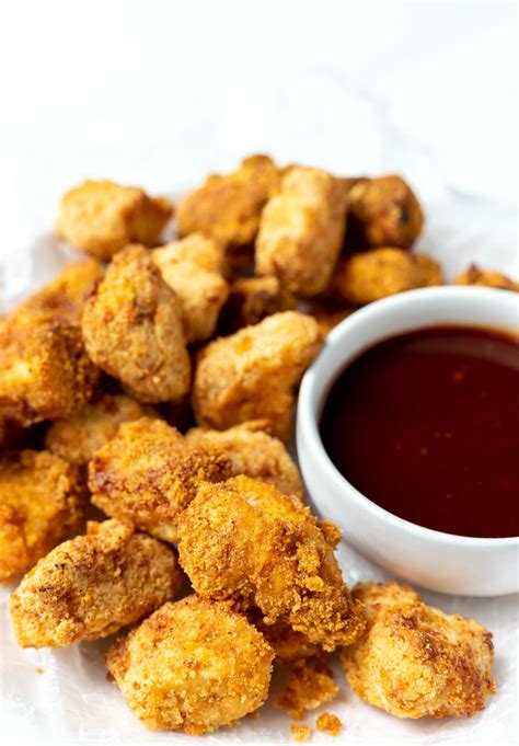 These chicken nuggets use real chicken breast meat so you know they will be a much higher quality than that ground bunch of mystery stuff you find in the drive thru. Air Fryer Chicken Nuggets Recipe - WonkyWonderful