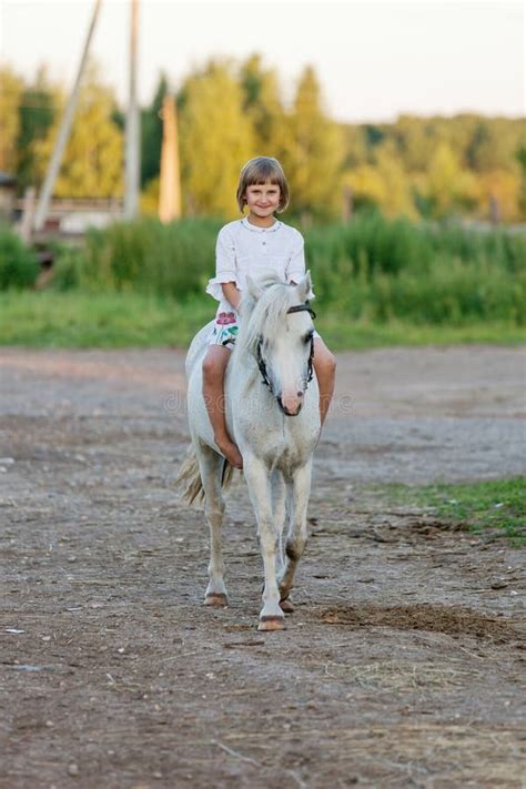 Little Girl Riding A Horse Stock Photo Image 43215706