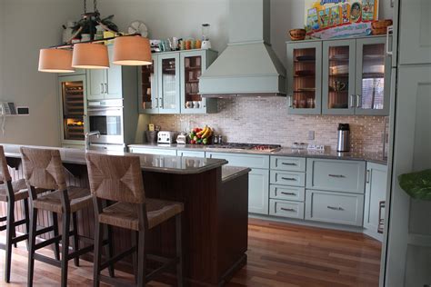 An Expansive L Shaped Kitchen With Granite Countertops Led Lighting