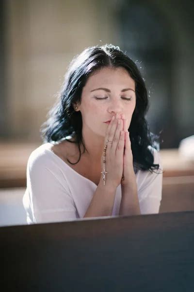 Woman Praying — Stock Photo © Halfpoint 82954114