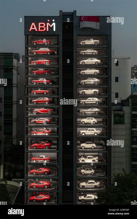 Worlds Largest Luxury Car Vending Machine Displays Red And White Cars
