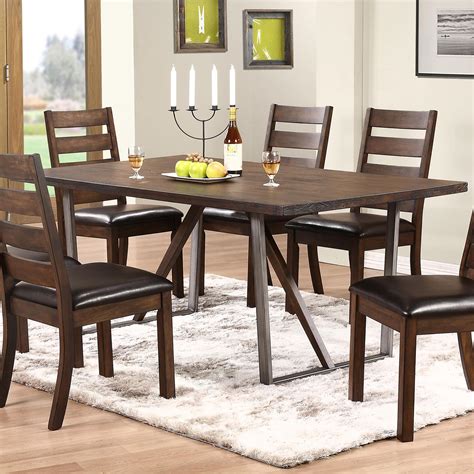 With quick and easy assembly, you can turn your outdoor area to a stylish dining oasis. Kendall Trestle Table with Metal Base | Rotmans | Dining Room Table