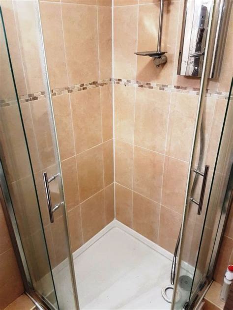 Cleaning bathroom tile is a crucial part of home maintenance. Mould and Limescale stained Shower Cubicle renovated in ...