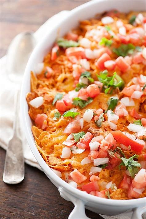 This dorito chicken casserole is a simple and flavorful dish with a crunchy dorito chip crust, creamy chicken filling, and crispy and cheesy topping. Dorito Casserole - a cheesy casserole the family goes ...