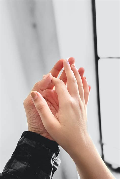 Two Person's Hands Holding Each Other · Free Stock Photo