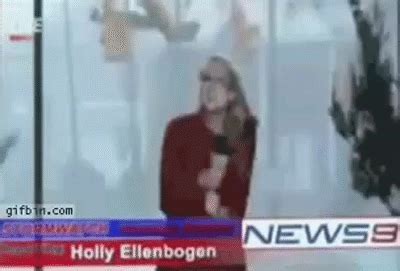 Reporter Gets Hit By A Stop Sign During Storm On Make A Gif