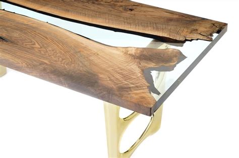This modern live edge dining table is handmade from old, reclaimed oak and solid wood with a fine copper inlay on top and finished with 3 coats of clear epoxy resin. Altin 200 Epoxy Resin Dining Table For Sale at 1stDibs