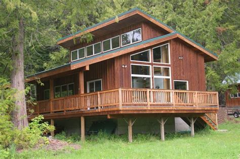 Roof truss design butterfly roof exposed rafters. Pin by Wallene Reimer on Siding Options | Modern cabin ...