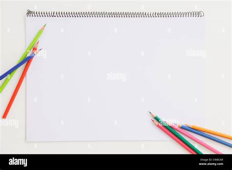 Different Color Pencil On Notepad Stock Photo Alamy