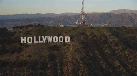 5K stock footage aerial video flyby the Hollywood Hills to reveal the ...