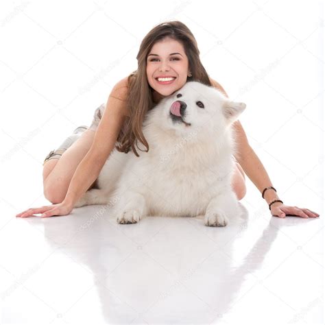 Young Woman Holding Her Dog Underneath Her — Stock Photo © Shotsstudio