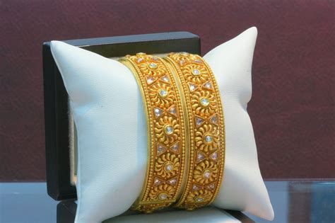 3,268 likes · 3 talking about this. Indian Jewellery and Clothing: Latest antique gold bangle models..