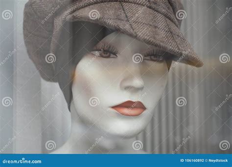 Woman Face Of Mannequin With Wig And Hat In Fashion Store Sho Stock