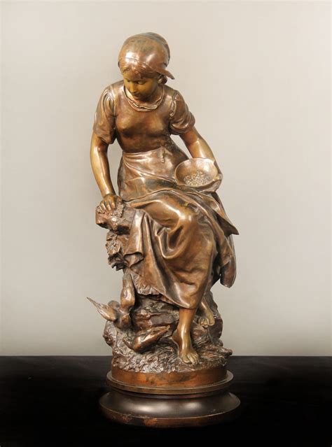 Late 19th Century Bronze Sculpture Of A Girl Seated And Feeding The