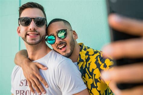 Premium Photo Gay Couple Taking A Selfie With Mobile Phone