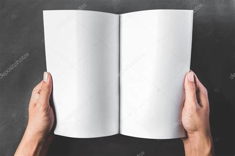 Hands Holding An Open Book With Blank Page — Stock Photo © Odua 82781434