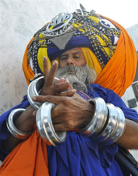 devout sikh wears the world s largest turban that takes six hours to put on and weighs 100lb