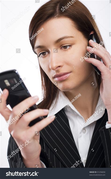 Attractive Young Woman Calling By Cellular Phone Stock Photo 31256650