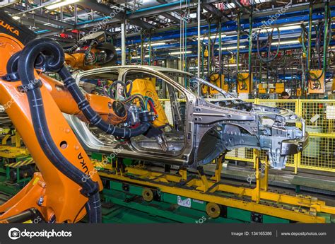 Em Uma Fábrica De Automóveis A Introdução De Um Sistema
