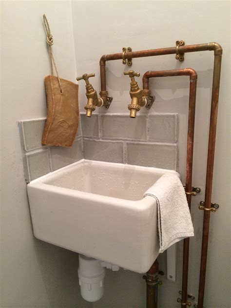 Copper Piping And Baby Belfast Sink In Cloakroom Trendy Bathroom