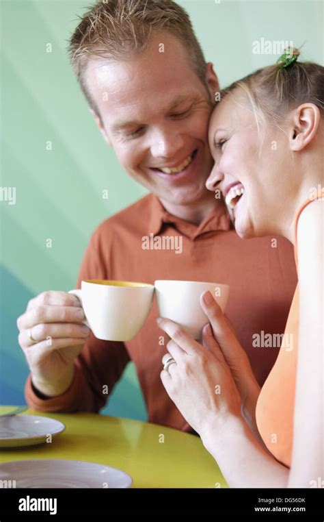 Couple Drinking Coffee Stock Photo Alamy