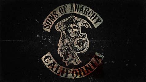 The Sons Of Anarchy Logo Is Shown In This Dark Background With Rusted