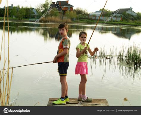 Children Fishing On The River — Stock Photo © Maxim1717 152478788