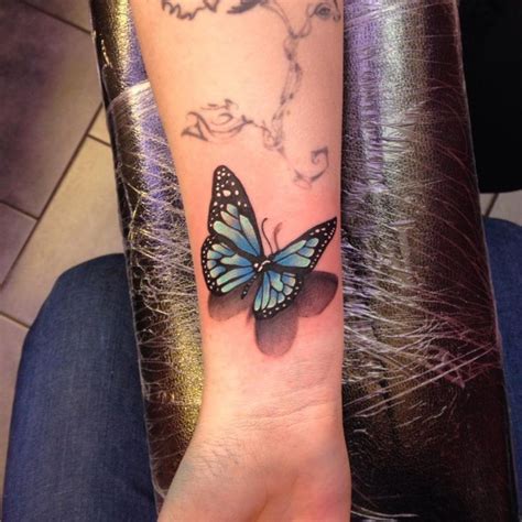 Blue Butterfly Wrist Tattoo Cool Wrist Tattoos Wrist Tattoos For