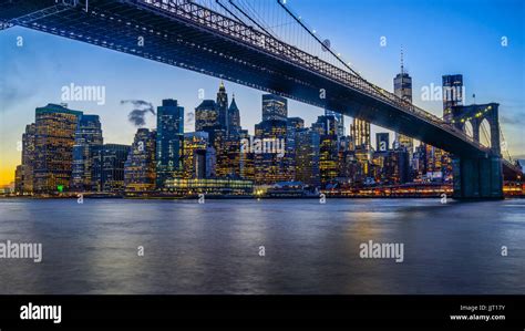 Downtown Manhattan Brooklyn Bridge With Brooklyn Bridge Park At Sunset
