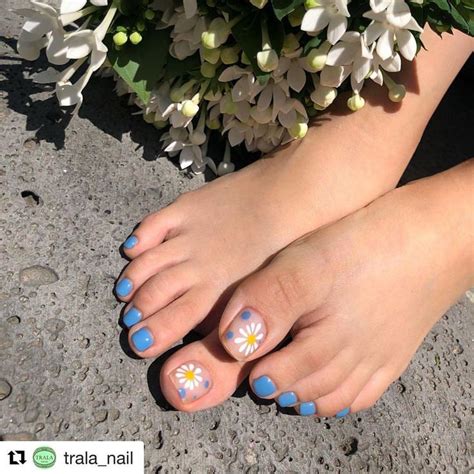 cool blue daisies pretty toenail art for summer feet 💙🌼💙 repost trala nail with get