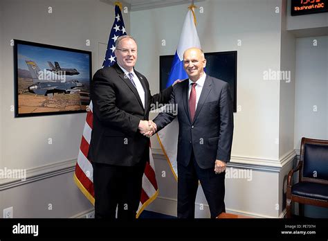 Deputy Secretary Of Defense Bob Work Shakes Hands With Finlands