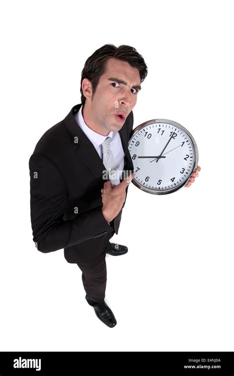 Man With A Big Clock Stock Photo Alamy
