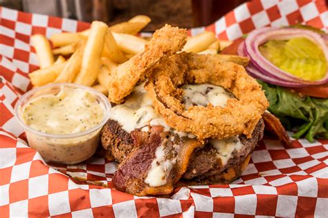 Satisfaction guaranteed · hand delivered by florist Grub's Bar & Grille - Rogers - Waitr Food Delivery in ...